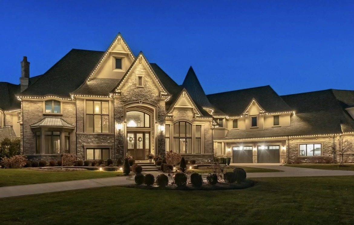 Warm white permanent LED lighting on a large home