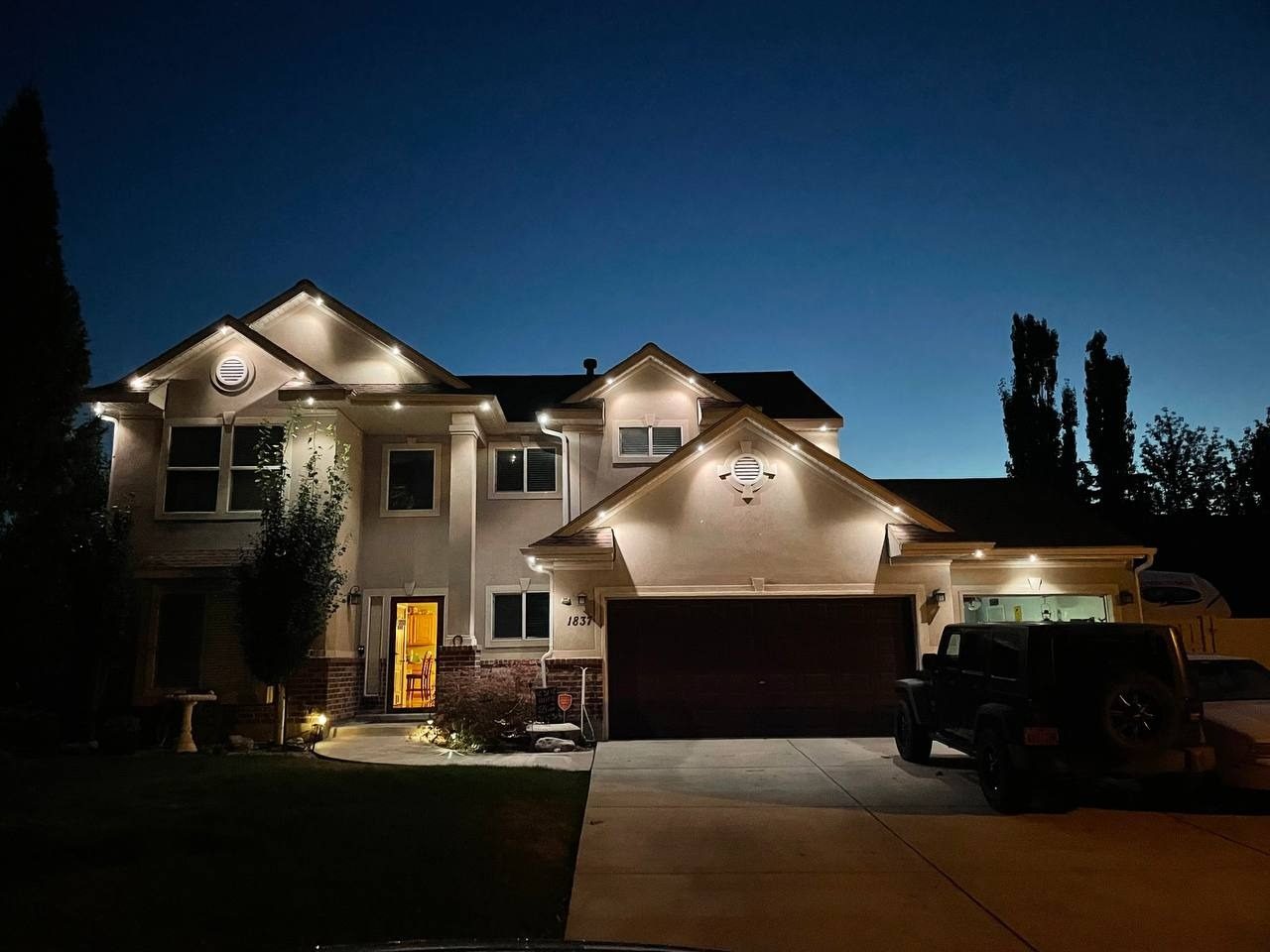Warm white permanent lighting at dusk